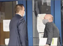  ?? Lori Van Buren / Times Union ?? Former Schenectad­y County jail guard Eugene Sellie, left, is seen with his attorney, Andrew Safranko, in this Nov. 17 file photo.