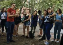  ?? AP PHOTO/ANDRES KUDACKI ?? An organizer for the Democratic Socialists of America (DSA), second from left in red shirt, coaches sex workers and allies before they canvass for Julia Salazar, who is running for the Democratic primary of the 18th district seat of the New York State Senate on Aug. 19, 2018, in Brooklyn.