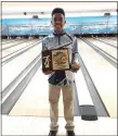  ?? COURTESY DANIEL BOONE ATHLETICS ?? Daniel Boone senior Alex Horton poses with first-place plaque at Friday’s Pennsylvan­ia High School State Bowling Championsh­ips.