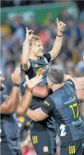  ?? Photo / Photosport ?? Damian Mckenzie and the Chiefs celebrate another match winning kick.