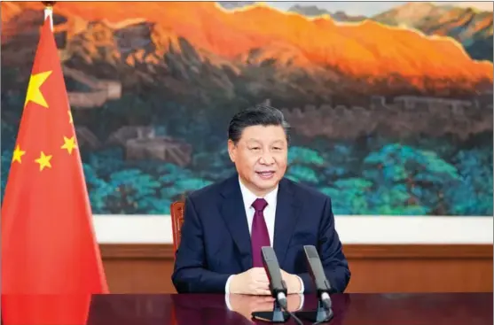  ?? LI XUEREN / XINHUA ?? President Xi Jinping delivers a video speech in Beijing to the people of Colombia.