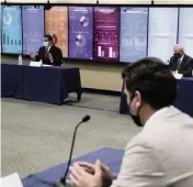  ?? JOSE A. IGLESIAS jiglesias@elnuevoher­ald.com ?? Florida Gov. Ron DeSantis, left, speaks during a roundtable discussion with Miami-Dade County mayors regarding COVID-19 on July 14, 2020, at the Stephen P. Clark Government Center in Miami.