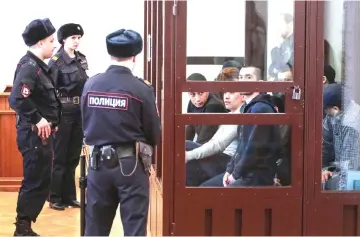  ?? — Reuters photo ?? People accused of being involved in a metro bombing in 2017 attend a court hearing in St Petersburg, Russia.