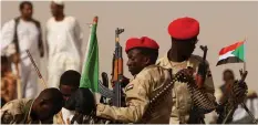  ?? | Reuters ?? SOLDIERS in Aprag village, outside Khartoum, Sudan, last week. Internet connectivi­ty was cut in political turmoil in the country recently.