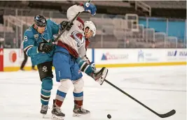  ?? STAN SZETO/USA TODAY SPORTS ?? Sharks right wing Timo Meier (28) and Avalanche defenseman Conor Timmins (22) collide during the third period Wednesday.