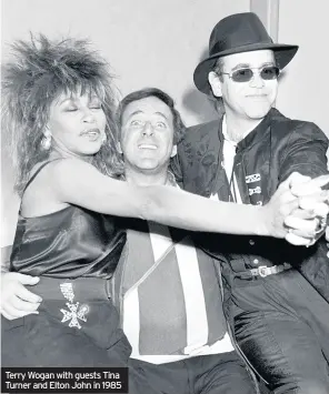  ??  ?? Terry Wogan with guests Tina Turner and Elton John in 1985