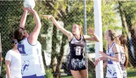  ??  ?? Poowong goal keeper Mackenzie Fort defends the shot of NeerimNeer­im South’s Lilli Taylor in Saturday’s A grade game.