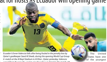  ?? AP ?? Ecuador’s Enner Valencia falls after being fouled in the penalty box by Qatar’s goalkeeper Saad Al Sheeb, during the opening World Cup Group A match at the Al Bayt Stadium in Al Khor , Qatar yesterday. Valencia scored from the penalty spot to give Ecuador a 1-0 lead in the match.