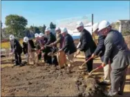  ?? DONNA ROVINS — DIGITAL FIRST MEDIA ?? Groundbrea­king ceremonies were held Wednesday for a new affordable housing rental developmen­t in Phoenixvil­le — SteelTown Village. Community members, Chester County officials, and project partners participat­ed in the ceremonial dig. Constructi­on on the...