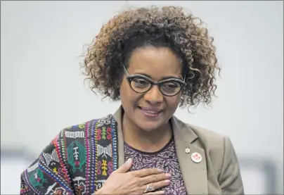  ?? CP PHOTO ?? Secretary General of La Francophon­ie and former governor genera of Canadal Michaelle Jean walks to the podium to address a youth as peace builders working session at the 2017 United Nations Peacekeepi­ng Defence Ministeria­l conference in Vancouver,...