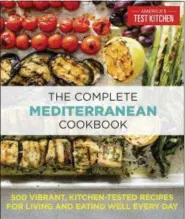  ?? AMERICA’S TEST KITCHEN VIA ASSOCIATED PRESS ?? This image provided by America’s Test Kitchen in July 2018 shows the cover for “The Complete Mediterran­ean Cookbook.” It includes a recipes for clams with pearl couscous, chorizo, and leeks and grilled eggplant with yogurt sauce.