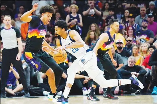  ?? ?? Phoenix Suns forward Cameron Johnson (23) defends against Dallas Mavericks guard Spencer Dinwiddie during the first half of Game 7 of an NBA basketball Western Conference playoff semifinal in Phoenix. (AP)