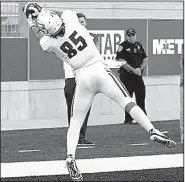  ?? Photo courtesy of UCA ?? Sophomore tight end Jack Short drags his foot in the end zone to stay inbounds as he catches quarterbac­k Luke Hales’ only touchdown pass on Saturday to give UCA a 16-7 victory over Abilene Christian in Abilene, Texas.