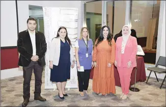  ?? ?? Group photo of organizers with Dr. Juliet Dinkha and Ms. Aya Abdulhadi