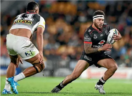  ?? GETTY IMAGES ?? Jazz Tevaga eyes a gap against the Penrith Panthers in round 24 last season.