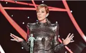  ?? VINCE BUCCI/INVISION VIA AP] [PHOTO BY ?? Allison Janney accepts the award Sunday for outstandin­g performanc­e by a female actor in a supporting role for “I, Tonya” at the 24th annual Screen Actors Guild Awards at the Shrine Auditorium & Expo Hall in Los Angeles.