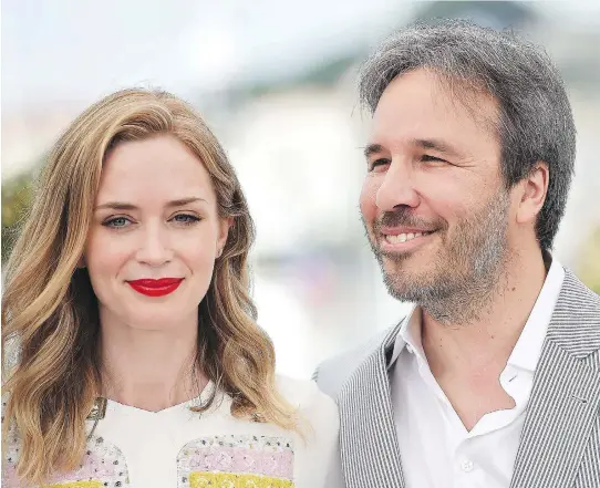  ?? ANNE-CHRISTINE POUJOULAT/AFP/GETTY IMAGES FILES ?? “I needed an actress able to bring the audience with her, someone who had inner strength,” Denis Villeneuve says of Emily Blunt. The director and star are pictured at the Cannes Film Festival in May.