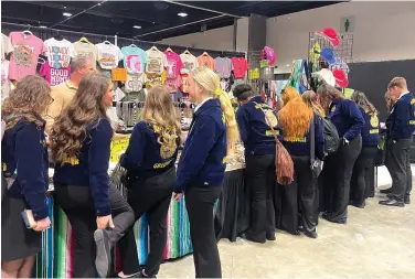  ?? (The Sentinel-Record/Hailey Grillo) ?? Students have the opportunit­y to explore a variety of booths for career, education, and merchandis­e shopping during the FFA Expo.