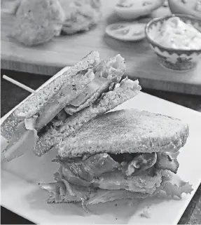  ?? [GRETCHEN MCKAY/PITTSBURGH POST-GAZETTE] ?? Fried green tomato BLT with herbed mayo