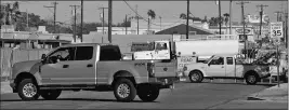  ?? FILE PHOTO BY RANDY HOEFT/YUMA SUN ?? VEHICLES TRAVELING NORTH on Arizona Avenue last October make U-turns after discoverin­g the street is closed at the intersecti­on with 20th Street for water and sewer work.