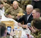  ?? EVAN VUCCI - THE ASSOCIATED PRESS ?? President Joe Biden visits with members of the 82nd Airborne Division at the G2A Arena, Friday, in Jasionka, Poland.