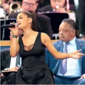  ?? SCOTT OLSON GETTY IMAGES ?? Among those who performed at Aretha Franklin’s funeral on Friday were Chaka Khan, left, and Ariana Grande. Centre, Franklin’s grandchild­ren Jordan and Victorie.