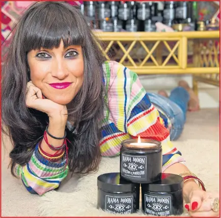  ?? Picture: TIM CLARKE ?? NEW FLAME: Semra Haksever quit her job to launch a range of candles which, she says, give off magical energy