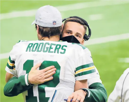  ?? REYDELRIO/GETTY ?? Packers quarterbac­k Aaron Rodgers and coach Matt LaFleur are thriving in their second season together.