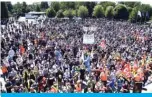  ??  ?? MAUBEUGE: A protester holds a banner reading “don’t touch MCA, it’s our plant” as they demonstrat­e against the Renault automaker’s decision to cut 15,000 jobs worldwide, including 4,600 in France, in Maubeuge, on Saturday.—AFP