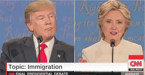  ??  ?? Donald Trump and Hillary Clinton debate immigratio­n policy during Wednesday night’s debate. | IMAGE FROM CNN
