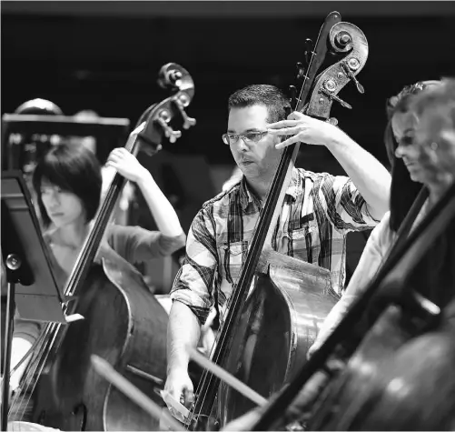  ?? John Lucas/ Edmonton Journal ?? The Edmonton Symphony Orchestra rehearses for its performanc­e of The Rite of Spring concert at the Winspear Centre on Friday.