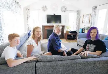  ?? Francine Orr Los Angeles Times ?? OSKAR LILJESTRAN­D, 12, Gwen Everman, Eric Liljestran­d and Melissa Liljestran­d at their L.A. home.