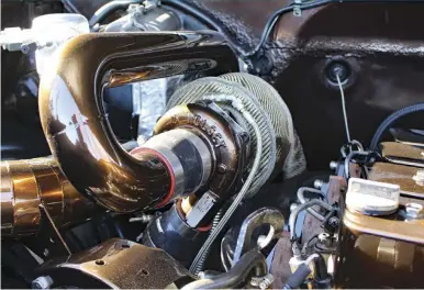  ??  ?? THE 4BT IS FORCE-FED 70 PSI OF BOOST COURTESY OF A COMPOUND TURBO ARRANGEMEN­T. SPEC’D AND FABRICATED AT LINCO DIESEL PERFORMANC­E, THE COMBINATIO­N INCLUDES A STOCK-BASED HOLSET HX25 OVER AN S363 ATMOSPHERE CHARGER FROM STAINLESS DIESEL. THE NON-WASTEGATED S300 SPORTS A 5-BLADE, 63MM BILLET COMPRESSOR WHEEL, A 68MM TURBINE WHEEL, AND A .83 A/R T4 DIVIDED EXHAUST HOUSING. A FACTORY SECOND-GEN INTERCOOLE­R HELPS LIMIT EGT TO A VERY MANAGEABLE 1,100 DEGREES F.