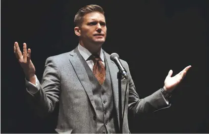  ?? ?? Richard Spencer, a white supremacis­t, speaks at the University of Florida in Gainesvill­e, Fla. Spencer has dubbed Bitcoin the “currency of the alt-right.”