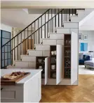  ??  ?? Integrated into an open-plan kitchen, this is under-stairs storage as you’ve never seen it before, by Roundhouse Design