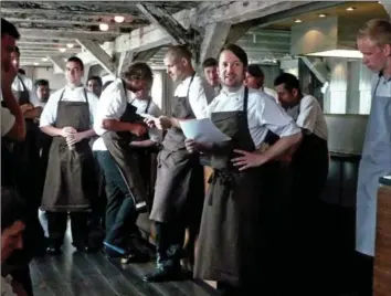  ?? BETTY HALLOCK, MCCLATCHY-TRIBUNE ?? Top: Noma chef Rene Redzepi gestures as he speaks about the ants used in his menu at the pop up restaurant “A Taste of Noma at the Claridges” at the London Mayfair hotel in 2012. Above: Rene Redzepi, centre, talks to his Noma staff in Copenhagen.