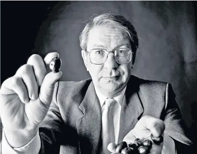  ?? ?? Philip James, photograph­ed in 1991, holding olives: ‘The rubbish that people eat is atrocious and the manipulati­on of poor people is unspeakabl­e’