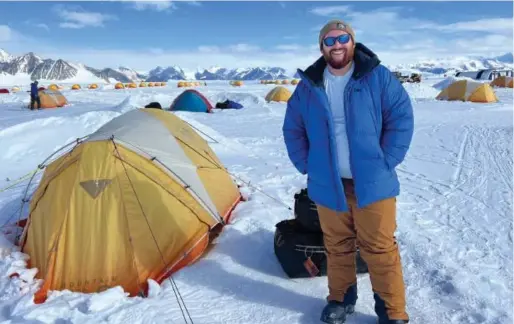  ?? ?? Above: John McKinney at an Antarctic Logistics & Expedition­s camp in Antarctica. typically hail from more than 25 countries.
Opposite:
McKinney with some of the company’s staff, which