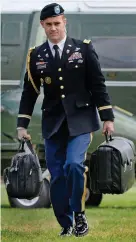  ??  ?? With President at all times: An aide holds the ‘nuclear football’