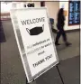  ?? Hearst Conn. Media file photo ?? A sign requires masks to be worn inside Town Hall in Greenwich on Jan. 19.