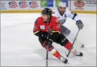  ?? PHOTO BY PAUL POST ?? Thunder defenseman Conor Riley looks for an open man to pass to during a recent game. Adirondack has a crucial two-game series against the first-place Manchester Monarchs this weekend.