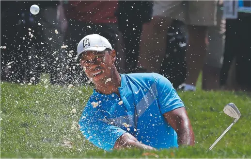  ??  ?? Pour la première fois de sa carrière, Tiger Woods ne s’est pas qualifié pour défendre un de ses titres. Alors que les 30 meilleurs joueurs de la PGA ont rendez-vous à East Lake la semaine prochaine, Woods regardera la compétitio­n à la télévision. - Associated Press: Nam Y. Huh