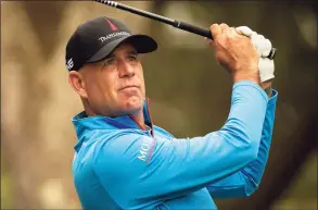  ?? Stephen B. Morton / Associated Press ?? Stewart Cink hits off the 16th tee during the second round of the RBC Heritage in Hilton Head Island, S.C., on Friday.