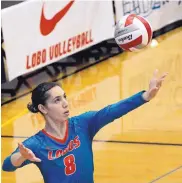  ?? JIM THOMPSON/JOURNAL ?? UNM’s Ashley Kelsey ranks fourth on the school’s career digs list. She plays her final home match tonight at Johnson Center.