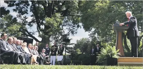  ?? Chip Somodevill­a Getty Images ?? PRESIDENT TRUMP announces the end of the U.S. commitment to the internatio­nal climate agreement to reduce carbon emissions.