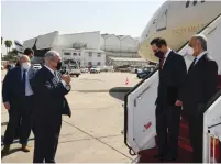  ?? ( Amos Ben Gershom/ GPO) ?? PRIME MINISTER Benjamin Netanyahu welcomes US Secretary of Treasury Steven Mnuchin and Obaid Humaid Al Tayer, minister of state for financial affairs, after the UAE- US delegation landed at Ben- Gurion Airport on Tuesday.