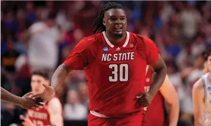  ?? Photograph: Tony Gutierrez/AP ?? DJ Burns has helped the NC State Wolfpack to a surprising run to the NCAA Tournament Final Four.