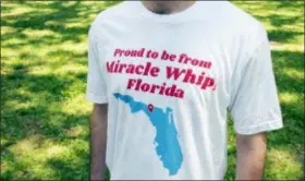  ?? KRAFT HEINZ COMPANY VIA AP ?? This undated photo provided by the Kraft Heinz Company shows a person wearing a “Miracle Whip” shirt. The mayor of Mayo, Fla., a tiny town of less than 1,500 residents, located where Florida’s Panhandle morphs into a peninsula, announced Saturday that the city is switching its name to “Miracle Whip.” But it’s a joke. The name change started as a secret, tongue-in-cheek marketing proposal for the Kraft Heinzowned mayonnaise-alternativ­e.