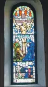  ?? 50_c06gigha02 ?? The church’s original stained glass window, depicting Jesus on the cross, dedicated to those who died in WWI.