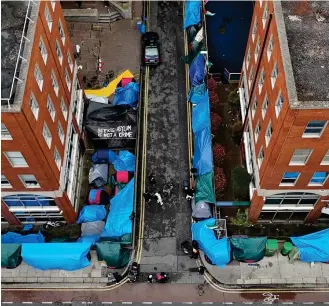  ?? ?? Encampment: Aerial view of tents crowding the pavements in Irish capital